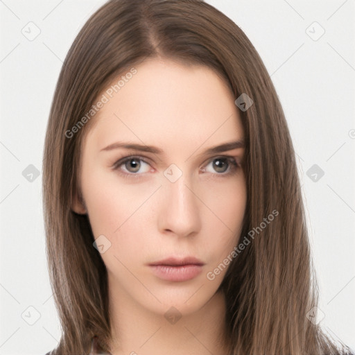 Neutral white young-adult female with long  brown hair and brown eyes