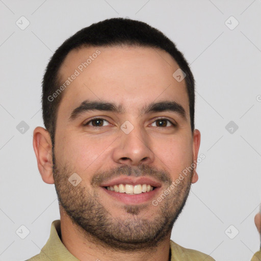 Joyful white young-adult male with short  black hair and brown eyes