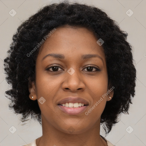 Joyful black young-adult female with long  brown hair and brown eyes