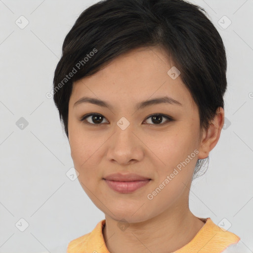 Joyful asian young-adult female with short  brown hair and brown eyes