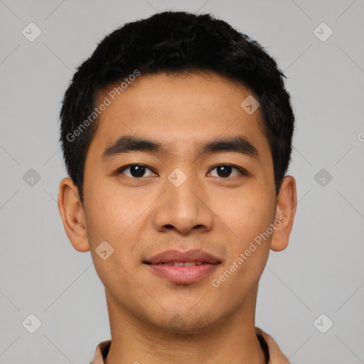 Joyful latino young-adult male with short  black hair and brown eyes