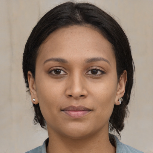 Neutral asian young-adult female with medium  brown hair and brown eyes