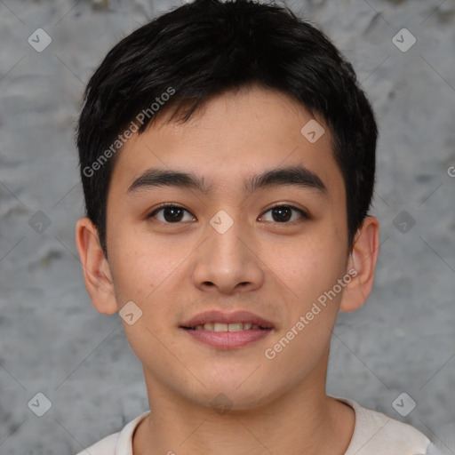 Joyful asian young-adult male with short  brown hair and brown eyes