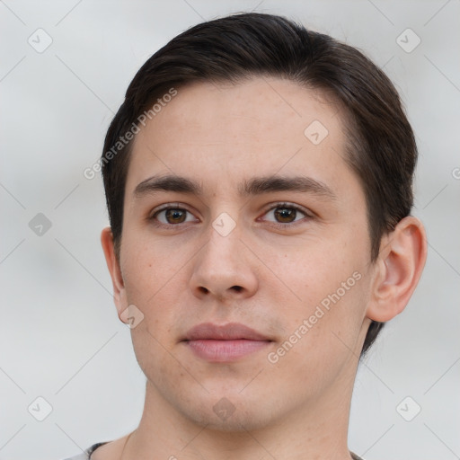 Neutral white young-adult male with short  brown hair and brown eyes