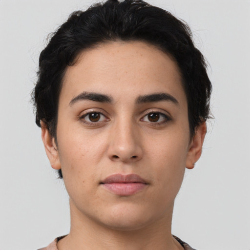 Neutral latino young-adult female with short  black hair and brown eyes