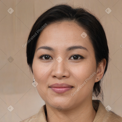 Joyful asian young-adult female with medium  brown hair and brown eyes