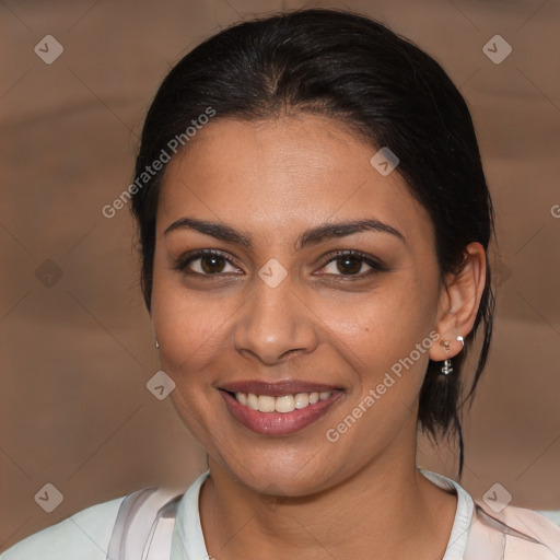 Joyful latino young-adult female with medium  brown hair and brown eyes