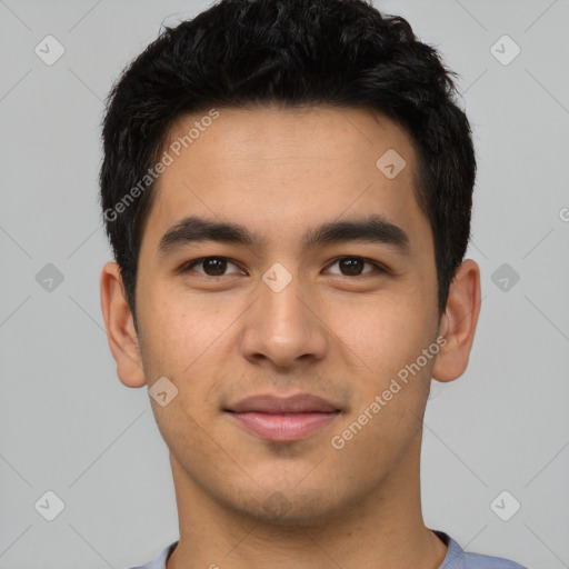 Joyful latino young-adult male with short  brown hair and brown eyes