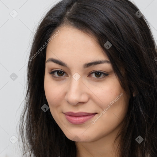 Joyful latino young-adult female with long  brown hair and brown eyes