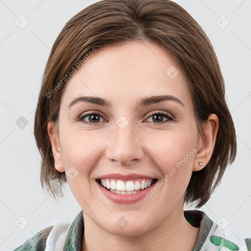 Joyful white young-adult female with medium  brown hair and green eyes