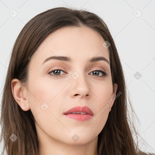 Neutral white young-adult female with long  brown hair and brown eyes