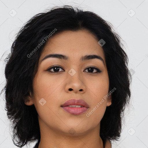 Joyful asian young-adult female with long  brown hair and brown eyes