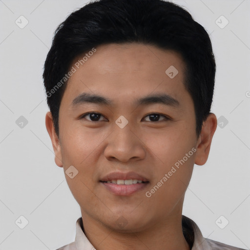 Joyful asian young-adult male with short  black hair and brown eyes