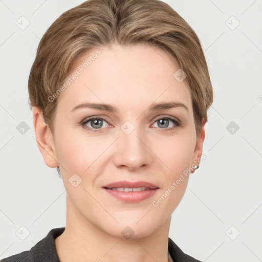 Joyful white young-adult female with short  brown hair and grey eyes