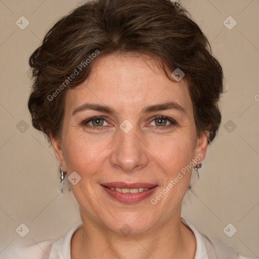 Joyful white adult female with short  brown hair and brown eyes