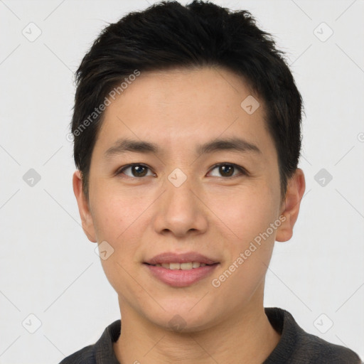 Joyful white young-adult male with short  black hair and brown eyes