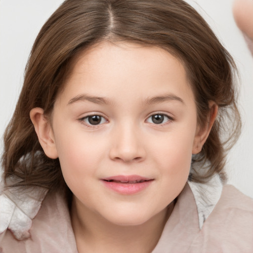 Joyful white child female with medium  brown hair and grey eyes