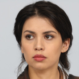 Neutral asian young-adult female with medium  brown hair and brown eyes