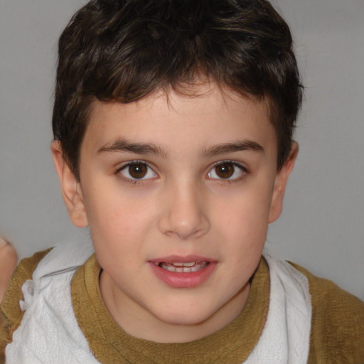 Joyful white child male with short  brown hair and brown eyes