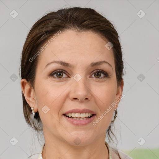 Joyful white adult female with medium  brown hair and grey eyes