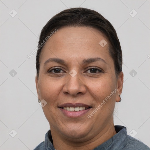 Joyful white adult female with short  brown hair and brown eyes