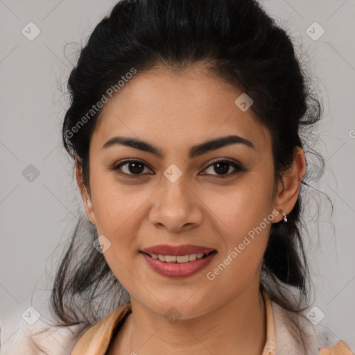 Joyful latino young-adult female with medium  brown hair and brown eyes