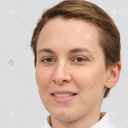 Joyful white young-adult female with short  brown hair and brown eyes