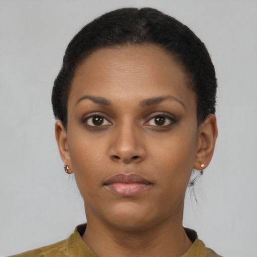 Neutral black young-adult female with short  brown hair and brown eyes