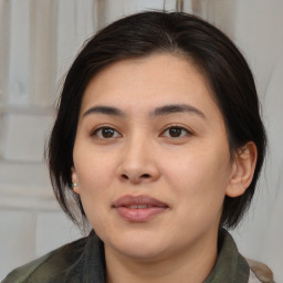 Joyful white young-adult female with medium  brown hair and brown eyes