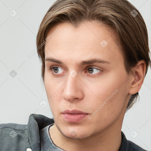 Neutral white young-adult male with short  brown hair and grey eyes