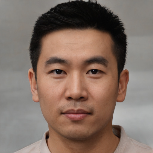 Neutral asian young-adult male with short  black hair and brown eyes