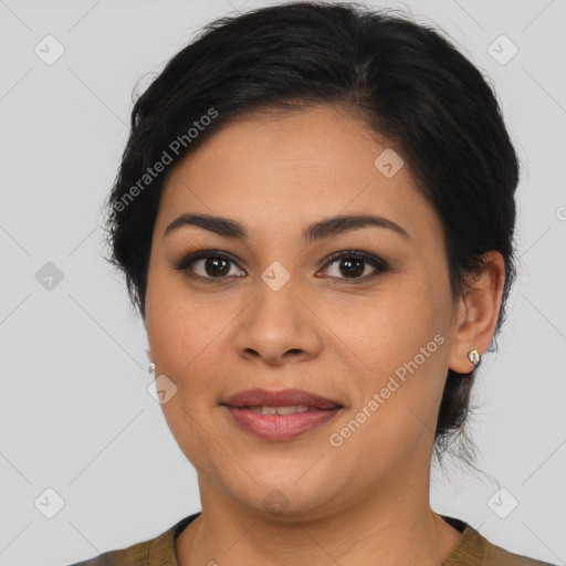 Joyful latino young-adult female with medium  brown hair and brown eyes