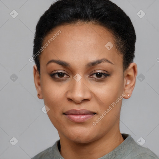 Joyful black young-adult female with short  black hair and brown eyes