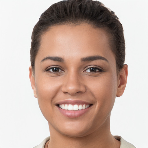 Joyful white young-adult female with short  brown hair and brown eyes