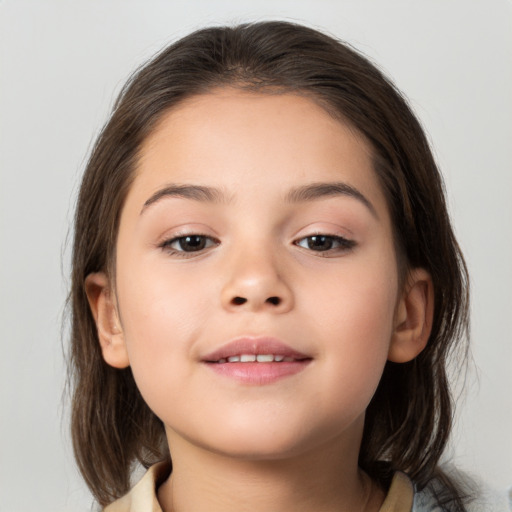 Joyful white child female with medium  brown hair and brown eyes