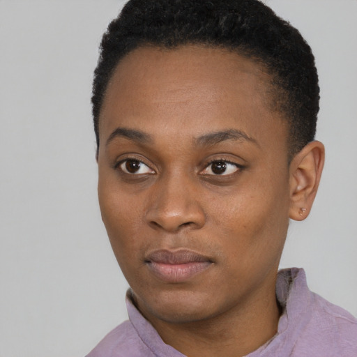 Neutral black young-adult female with short  black hair and brown eyes