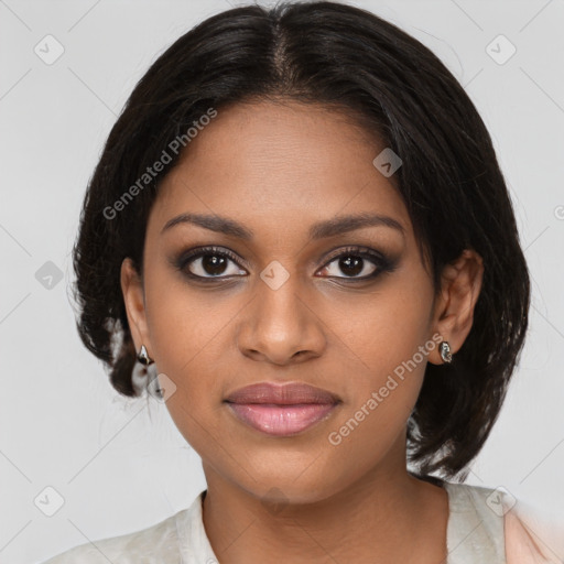 Joyful black young-adult female with medium  brown hair and brown eyes