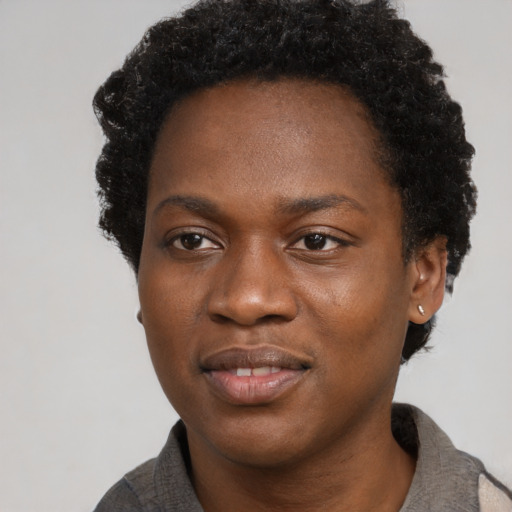 Neutral black young-adult female with short  black hair and brown eyes