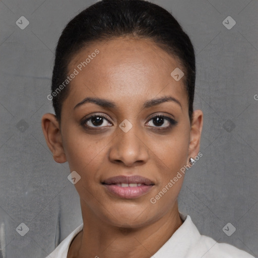 Joyful black young-adult female with short  brown hair and brown eyes