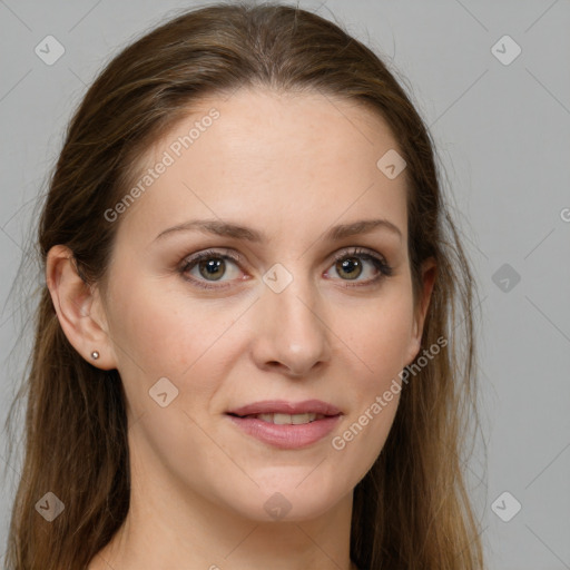 Joyful white young-adult female with long  brown hair and grey eyes