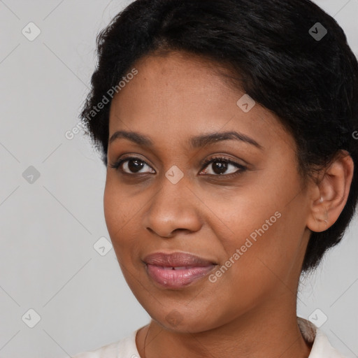 Joyful asian young-adult female with short  black hair and brown eyes