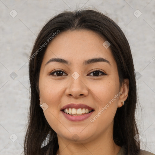 Joyful latino young-adult female with medium  brown hair and brown eyes