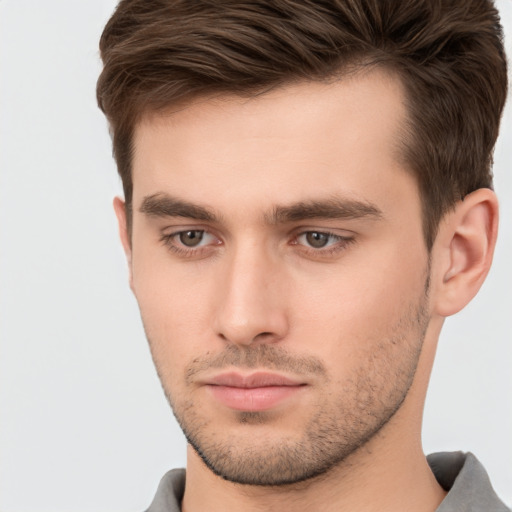 Neutral white young-adult male with short  brown hair and brown eyes