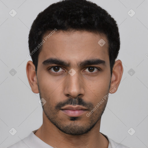 Neutral latino young-adult male with short  black hair and brown eyes