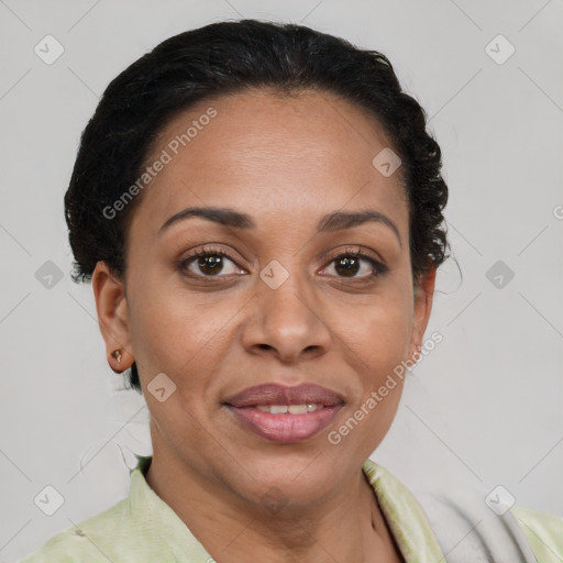 Joyful latino adult female with short  brown hair and brown eyes