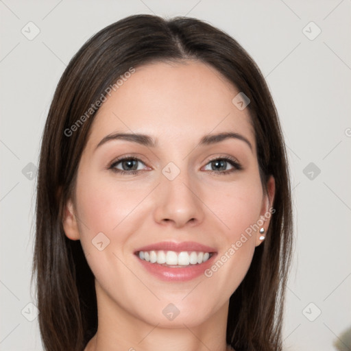 Joyful white young-adult female with long  brown hair and grey eyes