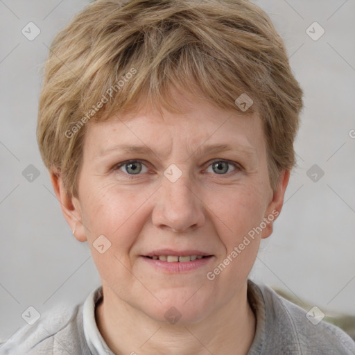 Joyful white adult male with short  brown hair and grey eyes