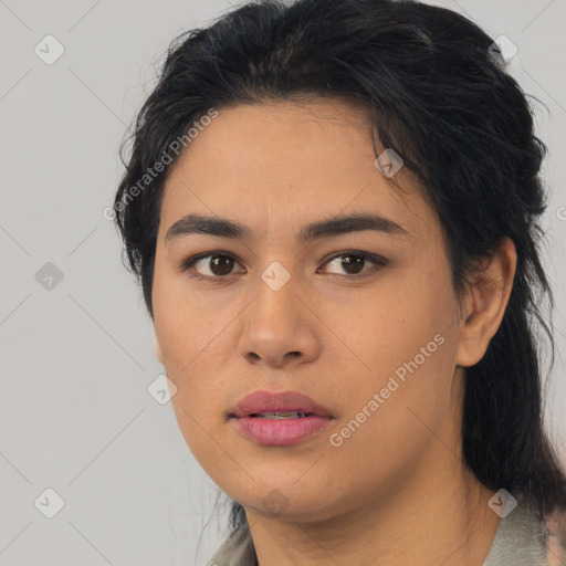 Joyful asian young-adult female with medium  black hair and brown eyes