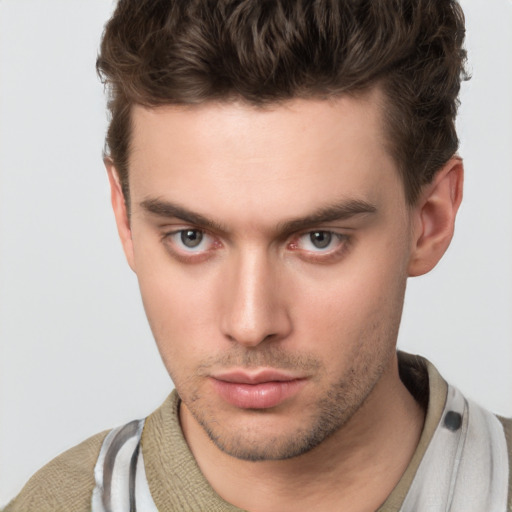 Neutral white young-adult male with short  brown hair and brown eyes