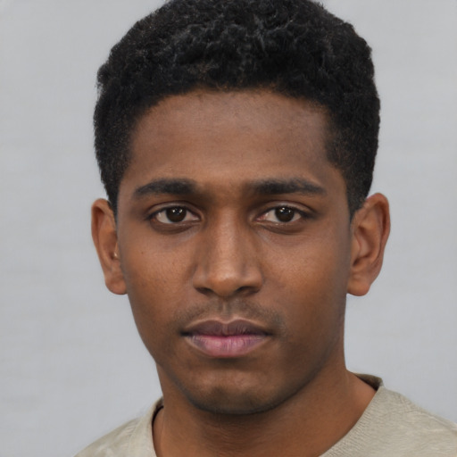 Neutral black young-adult male with short  black hair and brown eyes